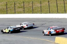 Speed around the track at Lake Erie Speedway in a NASCAR style race car.